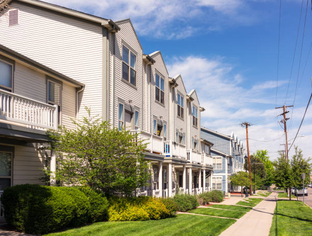 A view from the sidewalk of a simple modern apartment building in Denver, Colorado.