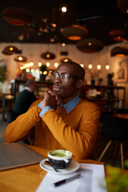 istock Pensive African-American Man in cafe 1149545197
