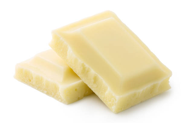 istock Two squares of white chocolate isolated on white. Rough edges. 1149545720