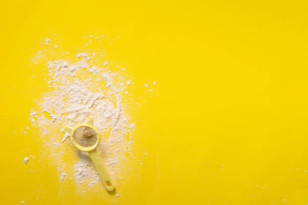 istock Flour sieve on yellow background. Baking and cooking concept. Banner with copy space. 1149547088