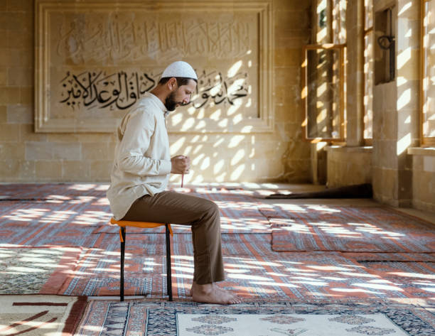istock Muslim man is praying in mosque 1149551340