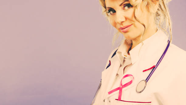 istock Doctor with pink cancer ribbon 1149556730