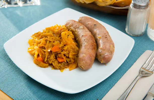 Photo of Sausages with braised cabbage