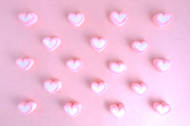 istock Heart marshmallow on pink background, Cute pattern background, Sweet background 1149559533