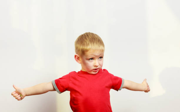 istock Little boy playing showing thumb up gesture 1149561418