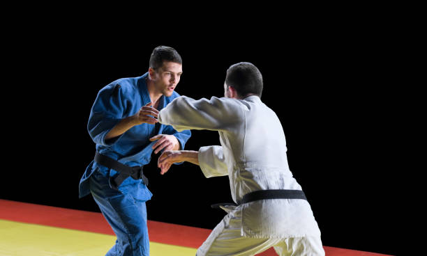 istock Judo players competing during match 1149564053