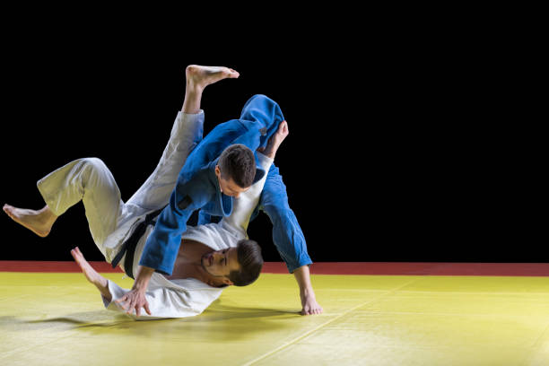 istock Judo players competing during match 1149564057
