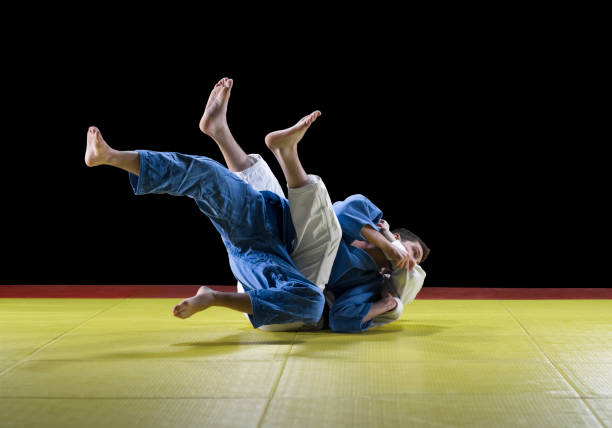 istock Judo players competing during match 1149564059