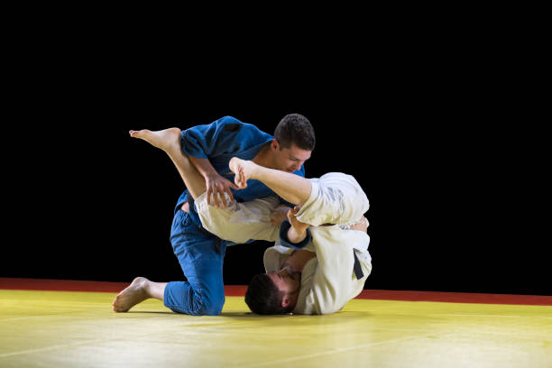 istock Judo players competing during match 1149564060
