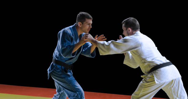istock Judo players competing during match 1149564064