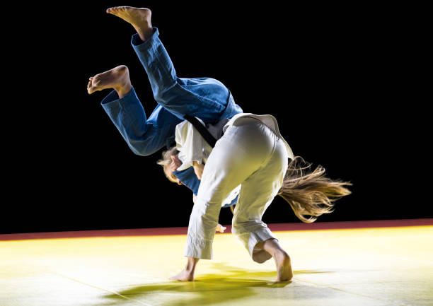 istock Judo players competing during match 1149564072