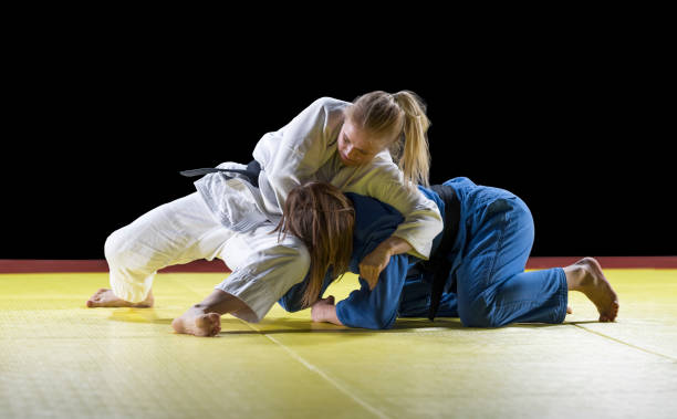 istock Judo players competing during match 1149564083