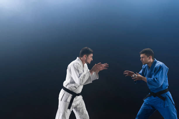istock Judo players competing during match 1149564089