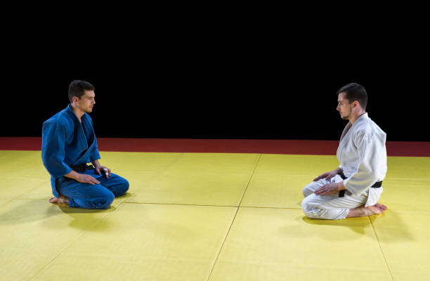 istock Judo players kneeling on mat 1149564092
