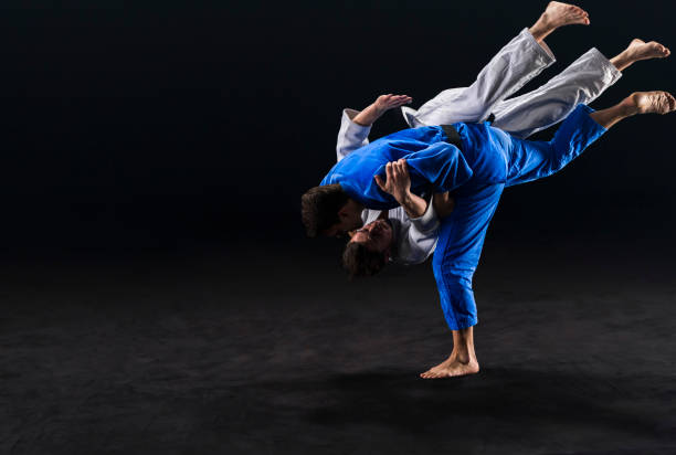 istock Judo players competing during match 1149564093