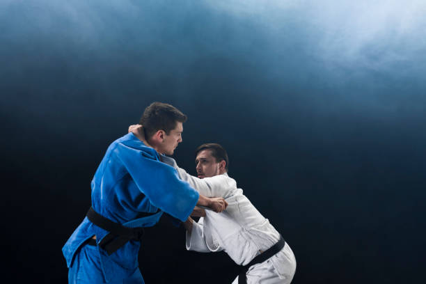 istock Judo players competing during match 1149564096