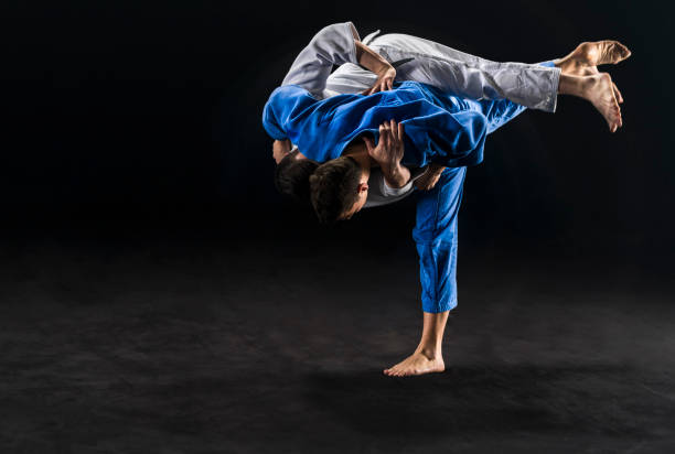 istock Judo players competing during match 1149564101