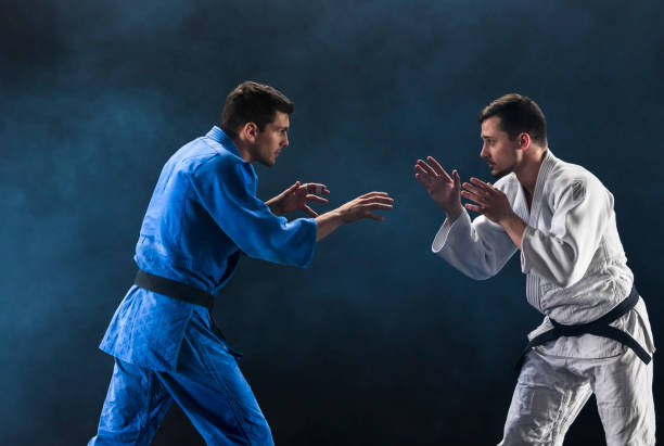 istock Judo players competing during match 1149564104