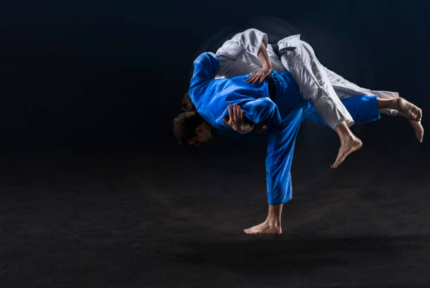 istock Judo players competing during match 1149564106