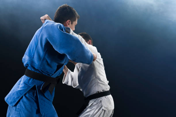 istock Judo players competing during match 1149564107