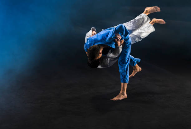 istock Judo players competing during match 1149564110