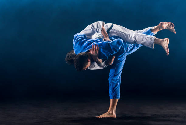 istock Judo players competing during match 1149564119