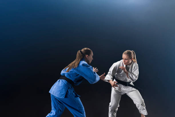 istock Judo players competing during match 1149564125
