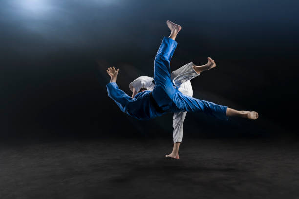 istock Judo players competing during match 1149564138