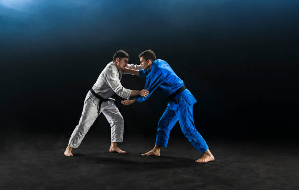 istock Judo players competing during match 1149564141