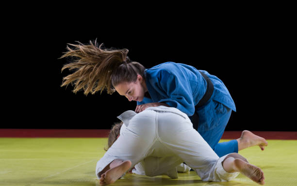 istock Judo players competing during match 1149564148