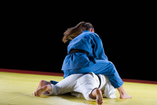 istock Judo players competing during match 1149564149