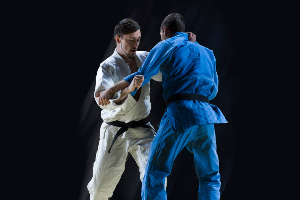 istock Judo players competing during match 1149564167