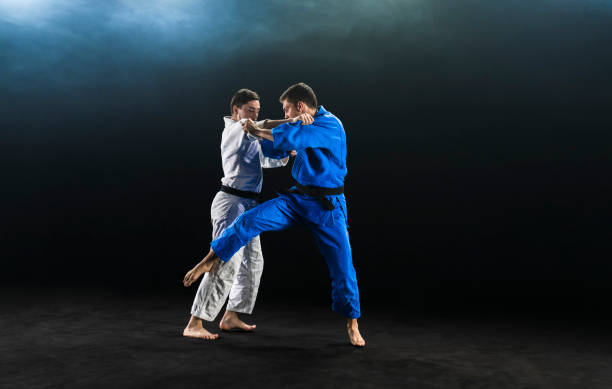 istock Judo players competing during match 1149564174