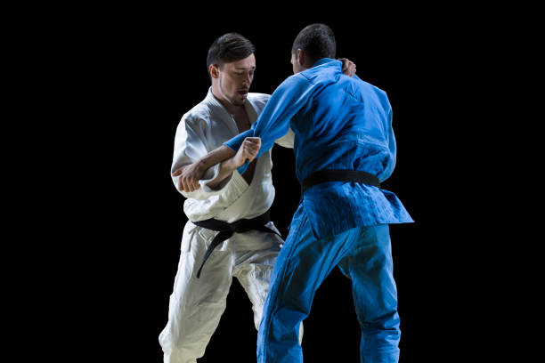 istock Judo players competing during match 1149564175