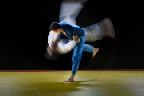 istock Judo players competing during match 1149564179