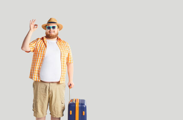 Fat Funny Man With A Suitcase Screaming On A Gray Background Stock Photo -  Download Image Now - iStock