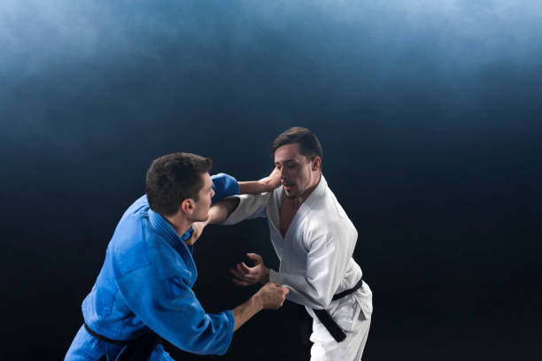 istock Judo players competing during match 1149565048