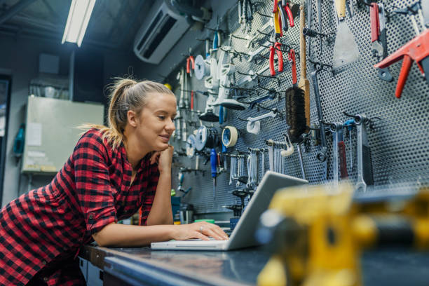 istock Female mechanic with laptop. 1149565056