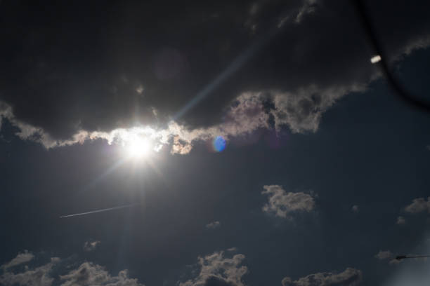 istock The sun shines bright in summer. Blue sky and clouds. 1149566397
