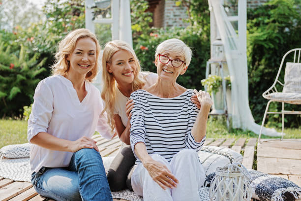 istock Three women enjoying outdoors, talking and laughing 1149567928