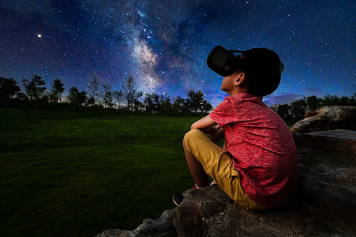 Boy watching the galaxy