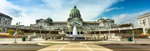 Building exterior and fountain of the Pennsylvania State Capitol building in downtown Harrisburg USA