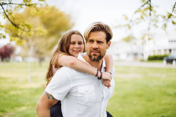 istock father with daughter having fun in the park 1149571601