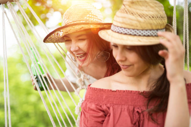 istock Two happy friends taking selfie in camping 1149571875