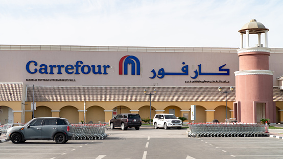 Doha, Qatar - February 2019: French international hypermarket chain Carrefour store logo in Doha, Qatar