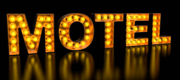 istock Motel signboard from golden light bulb letters, retro glowing font. 3D rendering 1149573906