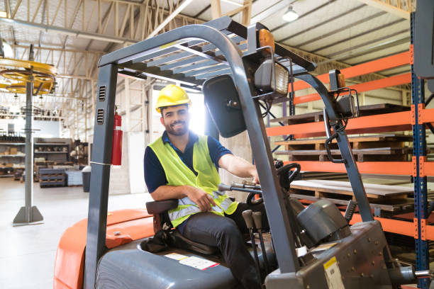 istock Portrait of smiling male worker on forklift 1149575264