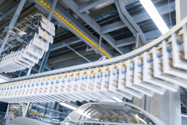 istock Conveyor belt with newspapers in printing press 1149575595