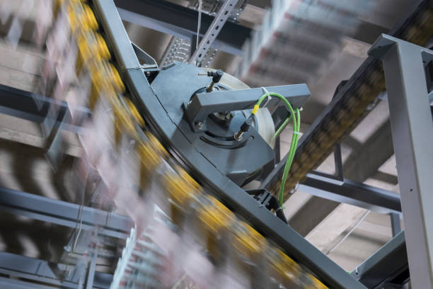 istock Conveyor belt with newspapers in printing press 1149575610