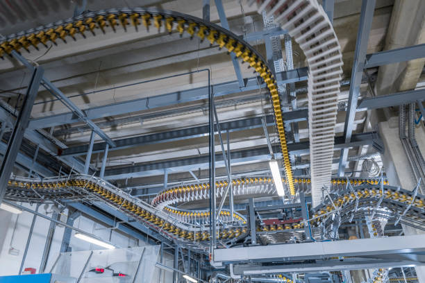 istock Conveyor belt with newspapers in printing press 1149575629